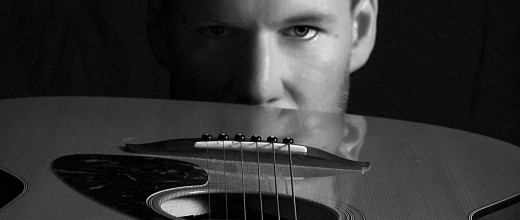 Jason Demmon with his Acoustic Guitar